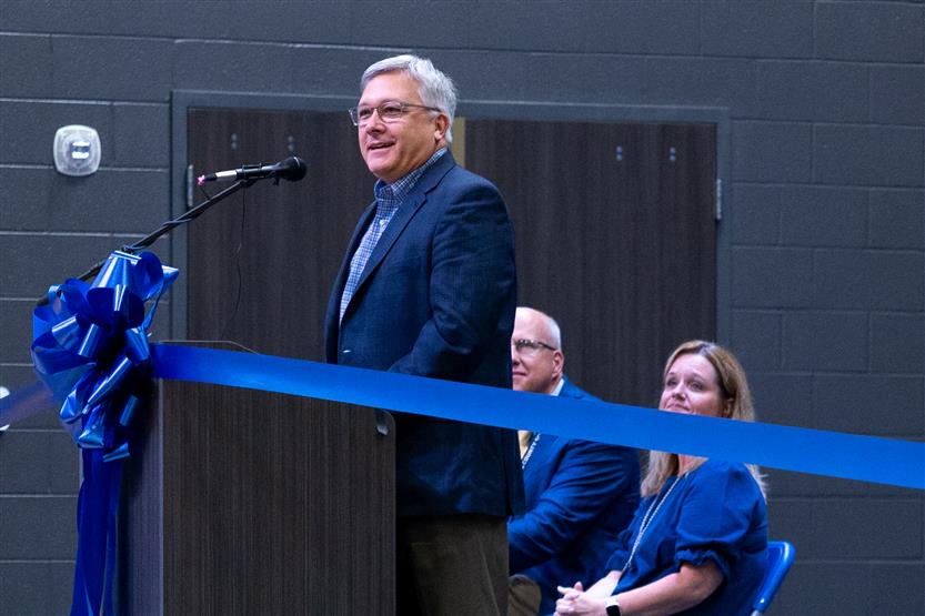 Students cut ribbon at new school
